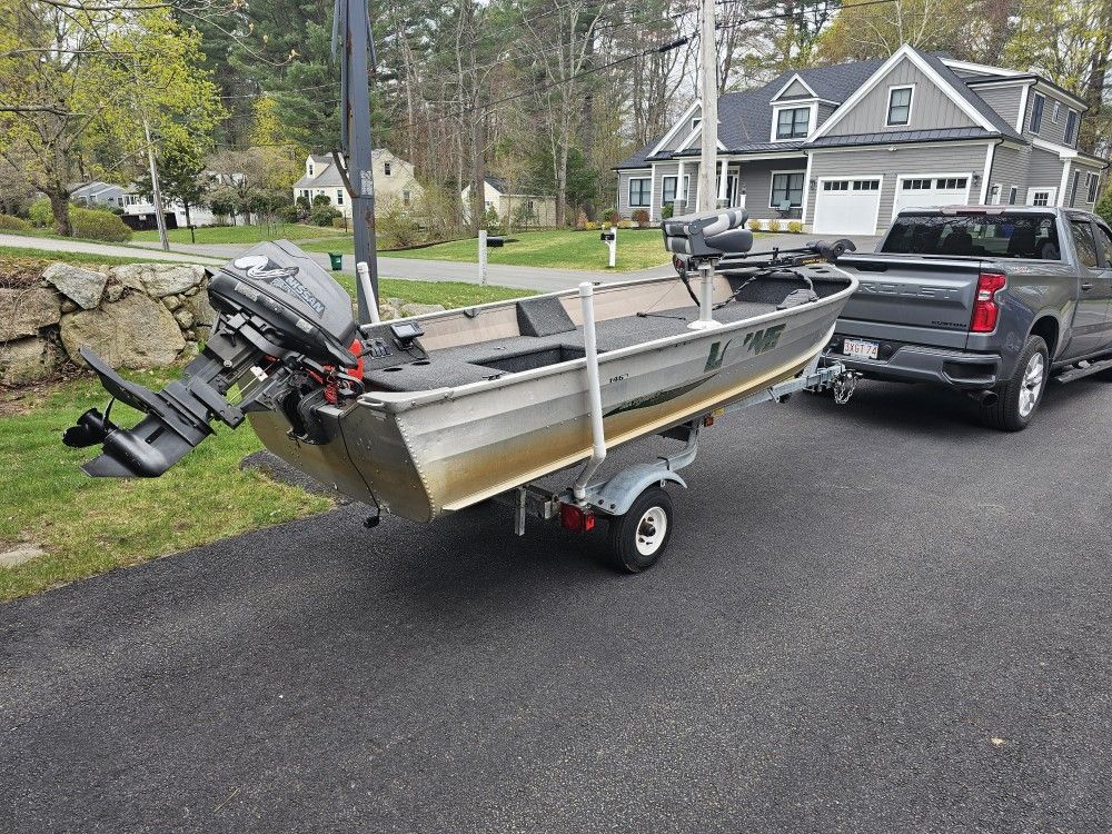 14 ' Aluminum Fishing boat with 15hp Nissan Motor and Trailer