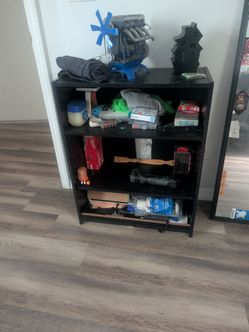 Black shelving unit or bookcase