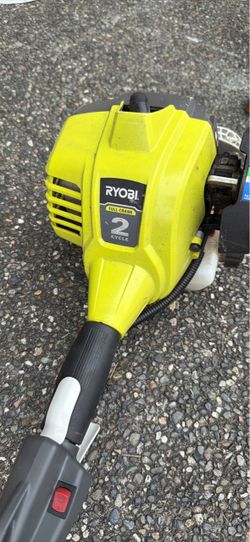 Ryobi 2 cycle Expand-It tool w/ Weed eater and chain saw attachment
