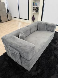 BONELESS GRAY COUCH