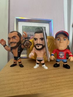 Randy orton, cm punk, and John cena mini figurines