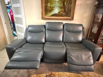 Reclining leather sofa
