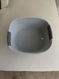 Gray cloth woven storage basket