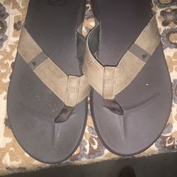 Reef Cushion Phantom flip flops in brown and tan synthetic material