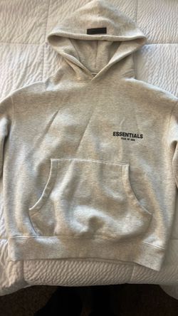 Two small ESSENTIALS hoodies