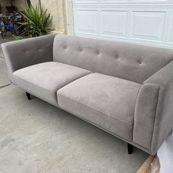 Brand new. Mid-century modern sofa. Taupe/silver velvet fabric. Retails over $1300