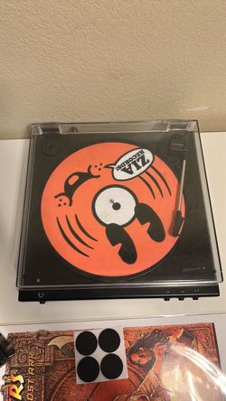 Vinyl record player and LG bluetooth speaker