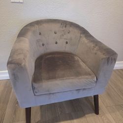 Grey velvet barrel chair