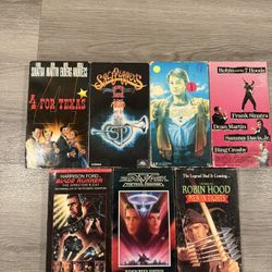 Lot of vintage VHS tapes with a mix of classic movies and popular titles.  Includes: 	•	Blade Runner (Director’s Cut) 	•	Star Trek V: The Final Fronti