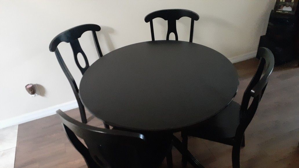 Black wood round table