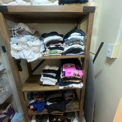 Rustic brown wood shelving unit 