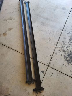 Hook on metal bedrails