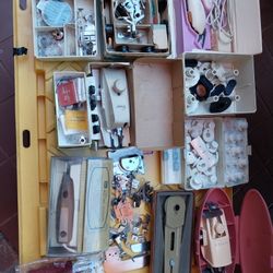 Singer Sewing machine attachment all in good condition.