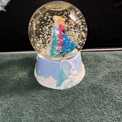 Disney’s frozen Elsa and Anna musical snow globe