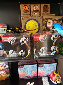 Pokemon Pitch Black and Chaos Rising booster boxes