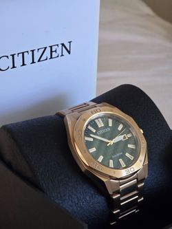 Citizen Eco-Drive® Weekender Sport Rose-Tone IP Watch with Textured Green Dial (Model: BM7633-81X) watch