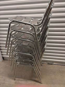 7 Metal Chairs And Table
