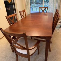 Kitchen Table And 6 Cushioned Chairs