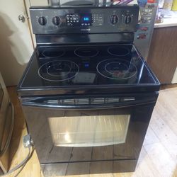 Reduced-Like New condition,  Works  Excellent,  5 Burner Glasstop with Dual Function Self-cleaning Convection Oven