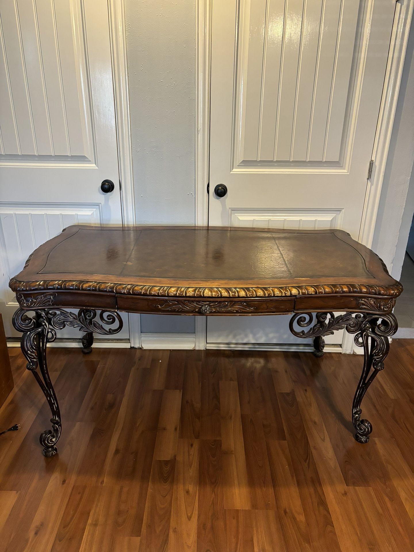 Wood Carved Desk With Leather Top And Steal Carved Legs 