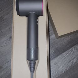 First-generation Dyson Supersonic hair dryer (Iron/Fuchsia)