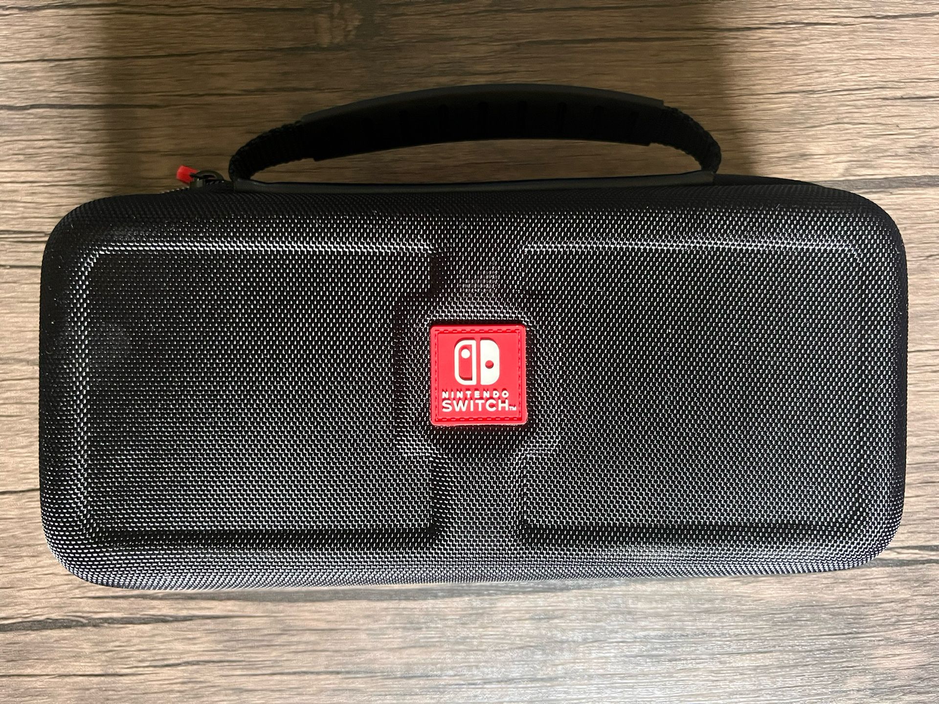 Nintendo Switch Console, carrying case, 4 games included