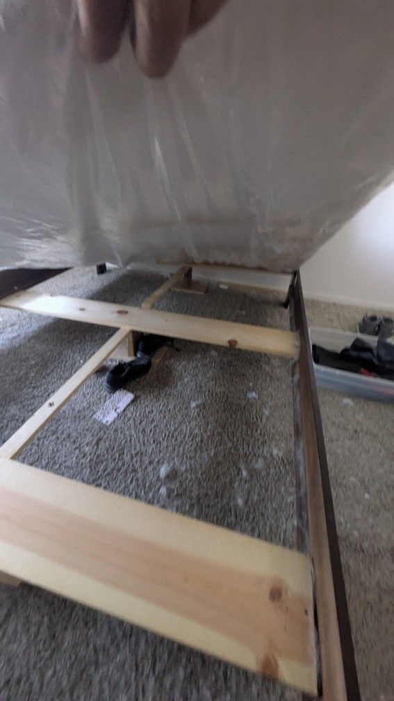 QUEEN SIZED WOODEN BED FRAME .
