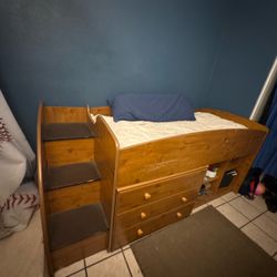 Twin bed with shelves and storage
