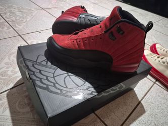 Air Jordan 12 Retros red and black
