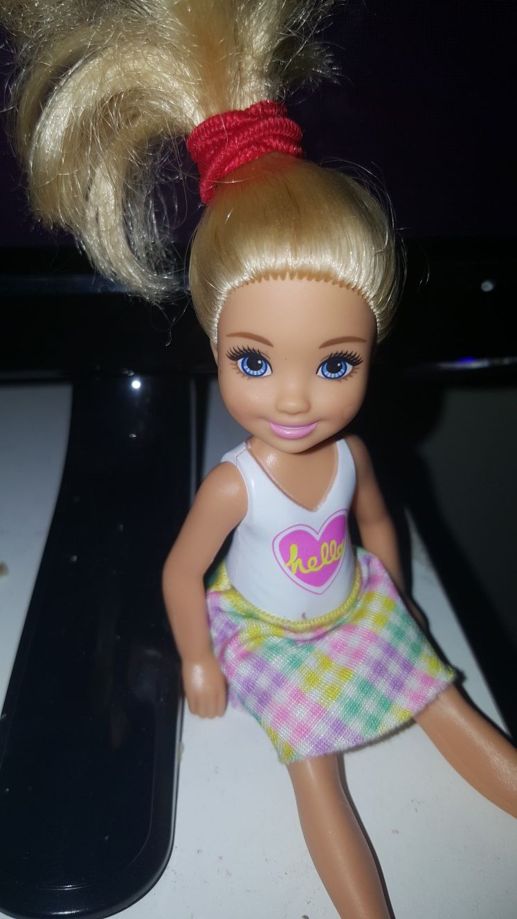 Chelsea dolls with out door play set
