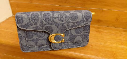 Brand new womens crossbody or shoulder bag . Comes with two belts