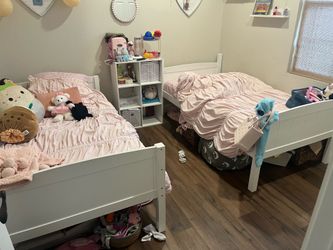 Free- 2 twin sized white bed frames