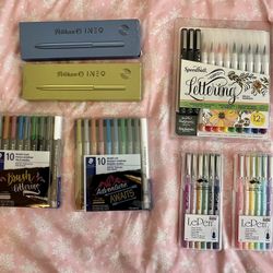 Variety of pens and markers all brand new