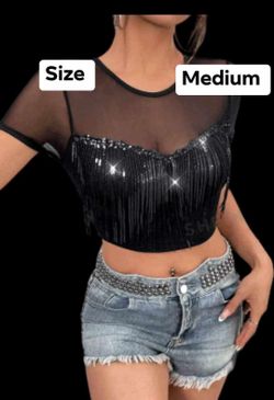 New women’s top size medium