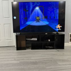 75” Samsung flat Screen And Stand 