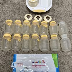 17 Medela bottles, fridge rack and new steamer bag