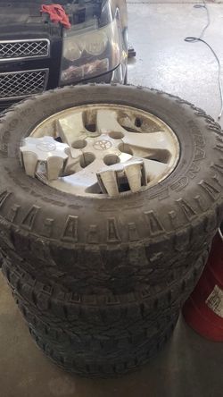 4 Toyota 6 lug wheels with used Duratracs