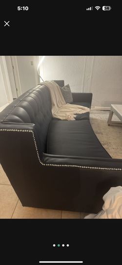 Two Leather Sofas