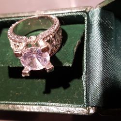 This Is A Beautiful Ring High-quality C Z Stones With A Very Shiny Stainless Steel Or White Gold Plating Gorgeous Ring I'm Selling It For A Lot Less