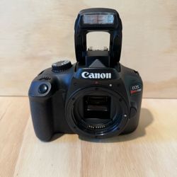 Canon EOS Rebel T100 18.0MP Digital SLR Camera Body Only Tested Good w/Charger!