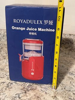 Royadulex portable, wireless citrus juicer featuring a red base and a white juicing mechanism