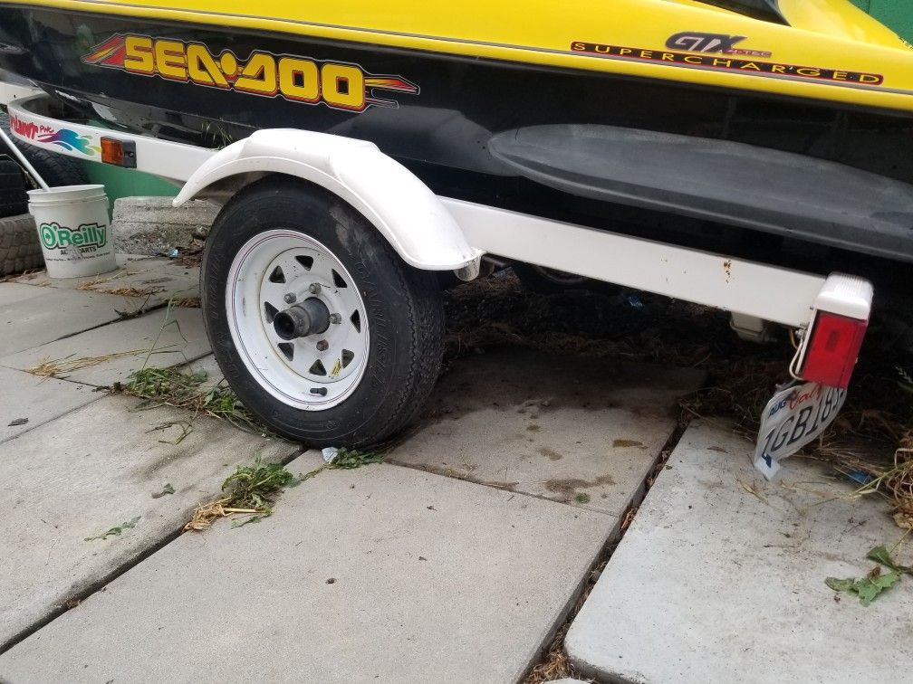 Trade jet ski trailer?