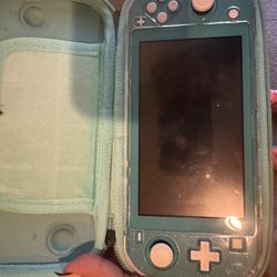 Nintendo Switch Lite Blue And Animal Crossing 