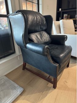 Blue chair wooden feet