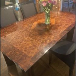 Maurice Valencia Dining Room Table And China cabinet 