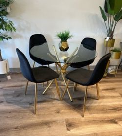 Table and black velvet chairs