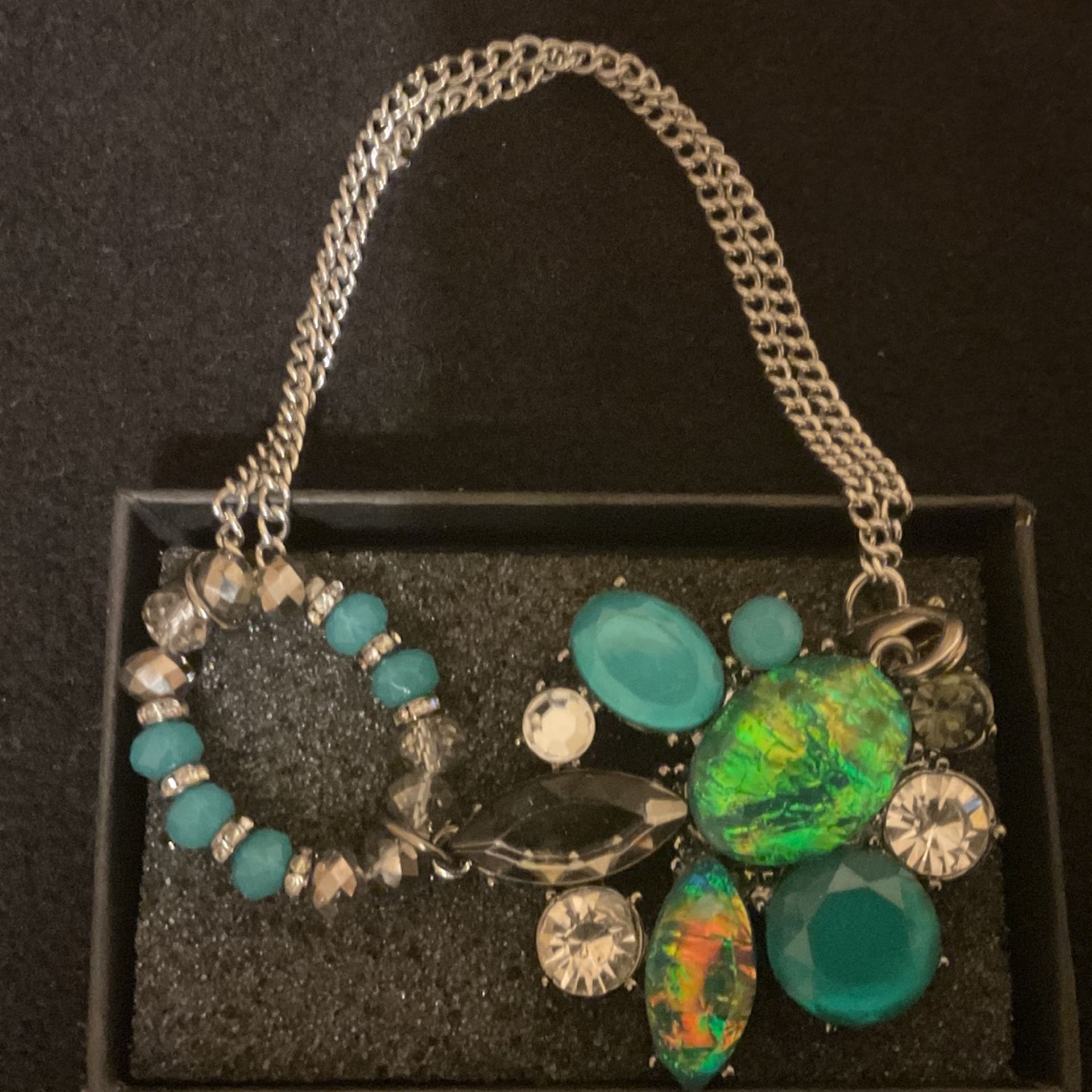 SilverTone/grayish Aqua Colored Rhinestones And Crystal Bracelet