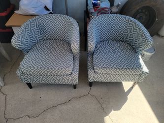 2 Deep-set armchairs