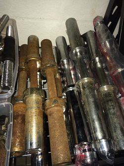 Olympic Weight Plate Loaded Dumbbell Handles- $50-$70 a pair.