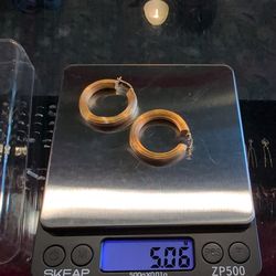 2-In 14 karat yellow gold hoops MELT